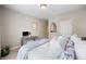 Bright bedroom featuring a cozy bed, desk area, and tranquil decor at 1270 Briarwood Ne Rd, Atlanta, GA 30319