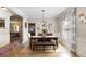 Elegant dining room with hardwood floors, chandelier, and large windows with natural light at 1270 Briarwood Ne Rd, Atlanta, GA 30319