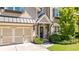 Charming two-story home with a well-manicured lawn, two-car garage, neutral siding, and black shutters at 1270 Briarwood Ne Rd, Atlanta, GA 30319