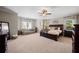 Large main bedroom with sitting area, ample natural light, and neutral color palette at 1270 Briarwood Ne Rd, Atlanta, GA 30319