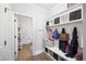 Mudroom with bench, storage cubbies, hooks, and access to half bath at 1270 Briarwood Ne Rd, Atlanta, GA 30319