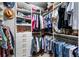 Organized walk-in closet features custom shelving, drawers, and ample hanging space for clothes and accessories at 1270 Briarwood Ne Rd, Atlanta, GA 30319
