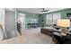 Upstairs loft area with study space, cozy seating, and ample natural light at 209 Chiswick Loop, Stockbridge, GA 30281