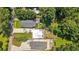 Top-down aerial shot of residential properties with verdant yards, showcasing neighborhood layout at 3131 Lee Cir, Buford, GA 30518