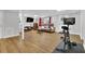 Finished basement offers ample space for recreation and relaxation with plush seating at 3131 Lee Cir, Buford, GA 30518