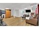 Spacious finished basement with recessed lighting, comfortable seating and entertainment area at 3131 Lee Cir, Buford, GA 30518