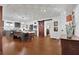 Dining and kitchen area features hardwood floors, gray cabinets, and a sliding barn door at 3131 Lee Cir, Buford, GA 30518