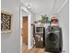 Well-organized laundry area with modern appliances and storage, great for household tasks at 3131 Lee Cir, Buford, GA 30518