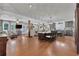 Spacious living area showcasing the open floor plan, hardwood floors, and neutral color palette at 3131 Lee Cir, Buford, GA 30518