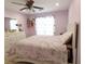 Bright bedroom featuring carpet, a Paris themed bedspread, and white furniture at 5157 Wellisford Ct, Suwanee, GA 30024