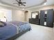 Large primary bedroom with king bed and expansive walk-in closet at 5157 Wellisford Ct, Suwanee, GA 30024