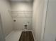 Functional laundry room features modern utility connections at 15 Fontana Ct, Covington, GA 30016