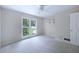 Bedroom with neutral walls and carpet, bright light and a double-hung window at 1956 Regents Way, Marietta, GA 30062