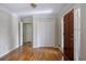 Welcoming foyer featuring hardwood floors, coat closet, and attractive trim work at 1956 Regents Way, Marietta, GA 30062