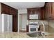 Close up shot of the kitchen with stainless steel appliances at 1956 Regents Way, Marietta, GA 30062