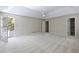 Spacious main bedroom with neutral tones, ensuite bathroom access, and a private balcony at 1956 Regents Way, Marietta, GA 30062