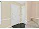 Clean foyer entrance with a neutral color scheme and space for entry decor at 4177 Elder Ln, Duluth, GA 30096