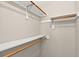 Spacious walk-in closet with multiple shelves and hanging rods, offering ample storage space at 4177 Elder Ln, Duluth, GA 30096