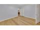 Spacious bedroom featuring hardwood floors, neutral walls and a closet with sliding doors at 849 N Park Ave, Marietta, GA 30060