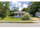 View of the front of the home, with a covered porch and well-maintained lawn at 849 N Park Ave, Marietta, GA 30060