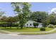 Charming home featuring a manicured lawn and mature shade trees at 849 N Park Ave, Marietta, GA 30060