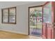 View from inside the living room out to the front porch and yard at 849 N Park Ave, Marietta, GA 30060