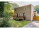 Well-maintained backyard featuring a deck, lawn, and landscaping at 2732 Arbor Se Ave, Atlanta, GA 30317
