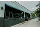 A building with a restaurant and bar in it, brick building with windows and awning at 2732 Arbor Se Ave, Atlanta, GA 30317