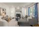 Cozy living room features a fireplace, plush seating, hardwood floors, and natural light at 2732 Arbor Se Ave, Atlanta, GA 30317