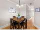 Bright dining area with wood floors, neutral walls, and decorative light fixture at 4206 Mastic Pt # 24, Acworth, GA 30101