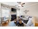Cozy living room with fireplace, ceiling fan, stylish furniture, and window at 4206 Mastic Pt # 24, Acworth, GA 30101