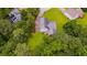 Aerial view highlighting a home with spacious lot, including a screened porch at 1876 Kathy Ct, Douglasville, GA 30135