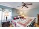 Bedroom with hardwood floors, and ceiling fan at 1876 Kathy Ct, Douglasville, GA 30135