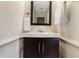 Stylish bathroom vanity featuring dark wood cabinets and a square sink, creating a clean and modern space at 3690 Lithia Way, Lithia Springs, GA 30122