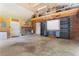 Spacious garage with work bench and storage shelves; perfect for projects and organization at 3690 Lithia Way, Lithia Springs, GA 30122
