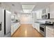 Well-lit kitchen with stainless steel appliances, granite counters, and spacious design at 3690 Lithia Way, Lithia Springs, GA 30122