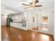 Bright kitchen with stainless steel appliances, plentiful white cabinets, and wood-look flooring at 3690 Lithia Way, Lithia Springs, GA 30122