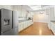 Bright kitchen features stainless steel appliances, granite countertops and adjacent dining area at 3690 Lithia Way, Lithia Springs, GA 30122