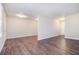 Spacious living room with new wood flooring and a neutral color palette at 4095 Indian Creek Cir, Stone Mountain, GA 30083