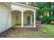 Cozy covered back porch with wood decking at 5271 Oglethorpe Ct, Powder Springs, GA 30127