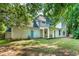 View of a spacious backyard with multiple access points at 5271 Oglethorpe Ct, Powder Springs, GA 30127