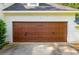 Close-up shot of a two car garage door at 5271 Oglethorpe Ct, Powder Springs, GA 30127
