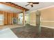 Renovations are underway to reveal a spacious living room with hardwood floors and classic molding detail at 5271 Oglethorpe Ct, Powder Springs, GA 30127