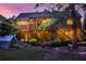 Home exterior with an expansive backyard, deck, patio, and a lush lawn at 1784 Virginia Grove Ln, Lawrenceville, GA 30045
