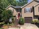 Charming two-story home featuring manicured landscaping and a welcoming front entrance at 1784 Virginia Grove Ln, Lawrenceville, GA 30045