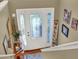 Inviting front entrance with a decorative glass door, wooden flooring, and stylish decor at 1784 Virginia Grove Ln, Lawrenceville, GA 30045