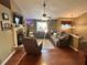 Inviting living room featuring hardwood floors and a beautiful fireplace at 1784 Virginia Grove Ln, Lawrenceville, GA 30045