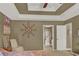 A bedroom with an ensuite bathroom featuring a large patterned bed at 1784 Virginia Grove Ln, Lawrenceville, GA 30045
