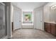 An expansive bathroom featuring dual vanities, a soaking tub, a walk-in shower, and two closets at 1786 Jameson Cir, Lawrenceville, GA 30043