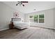 Bedroom featuring a large window allowing in ample natural light at 1786 Jameson Cir, Lawrenceville, GA 30043